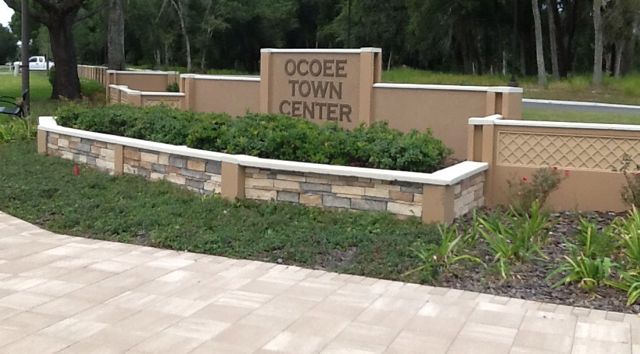 Wall unit with post, panel, wall cap and post caps. Ocoee Town Center, Ocoee, FL